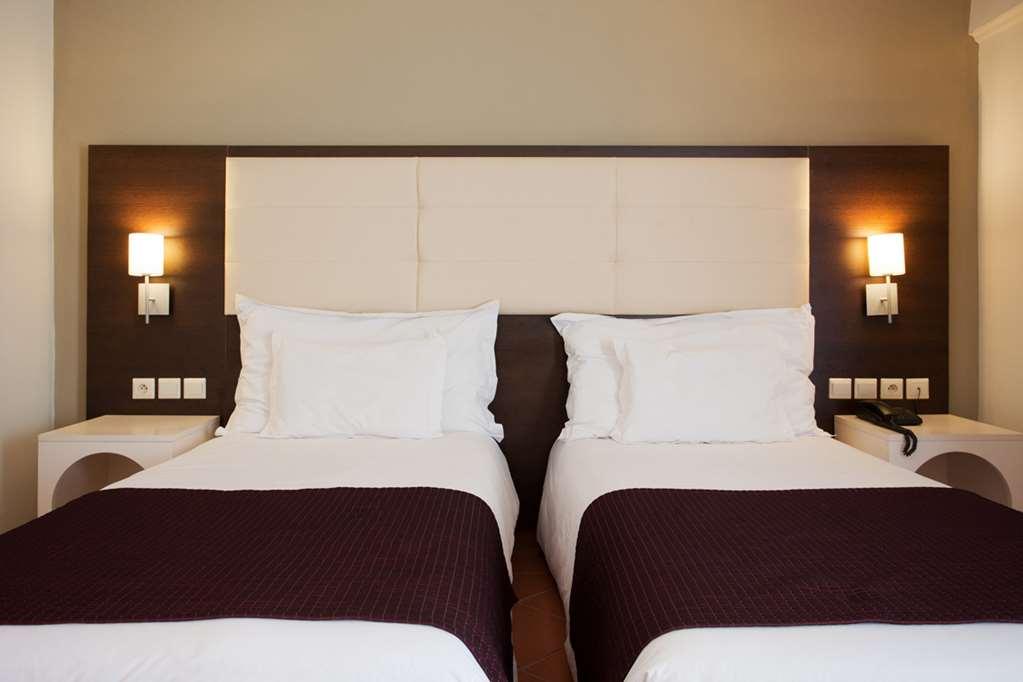 ホテル ケンジ ヨーロッパ アガディール 部屋 写真 A typical bedroom at a hotel